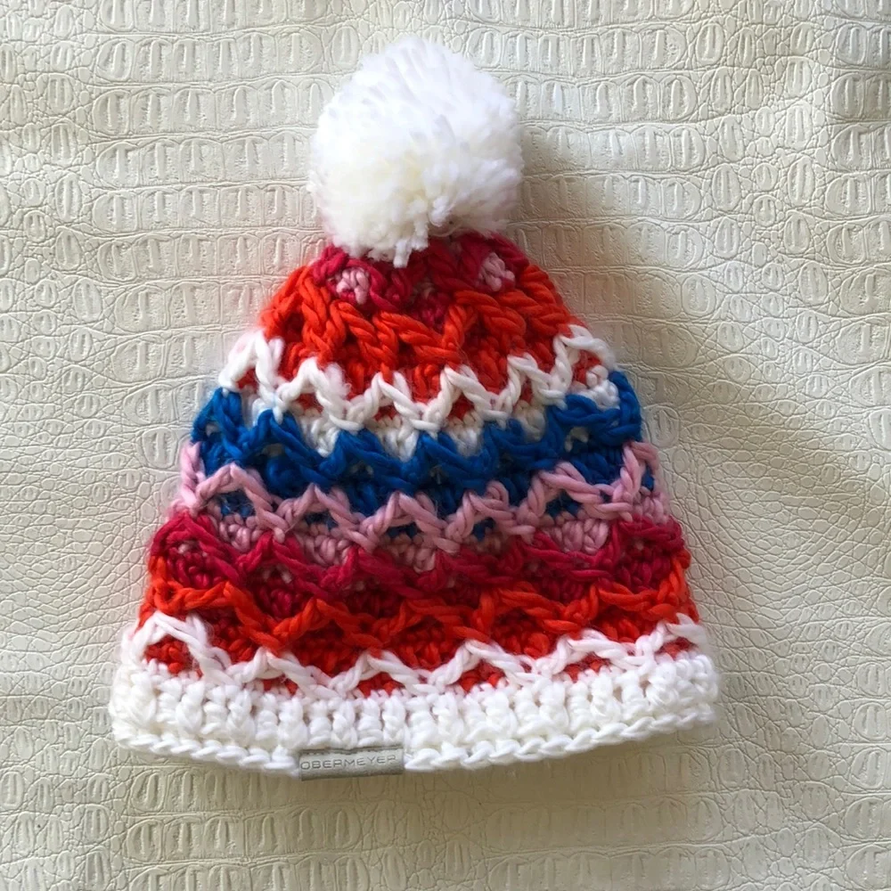Obermeyer Teen  knit hat white blue red with pompom